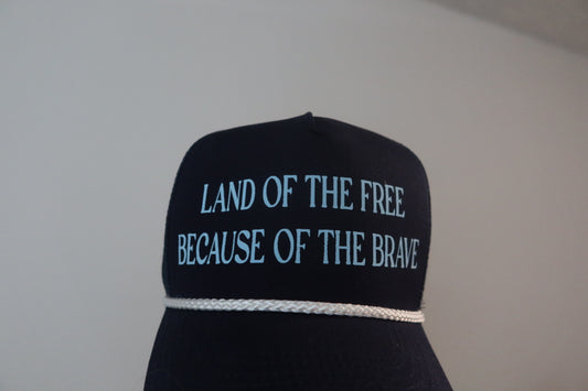 LAND OF THE FREE BECAUSE OF THE BRAVE-NAVY AND LIGHT BLUE HAT
