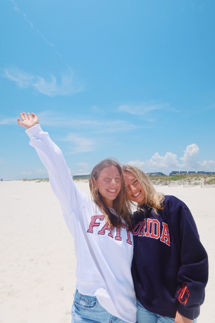 FLORIDA- TRUE NAVY AND RED POLKA DOT MOCK NECK