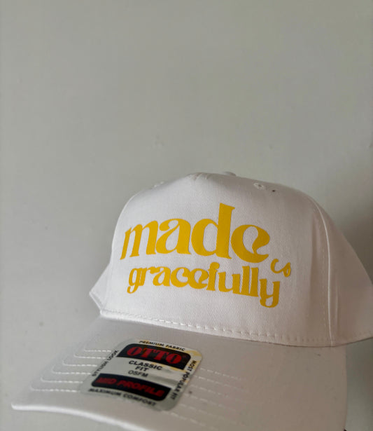 WHITE AND YELLOW LOGO HAT