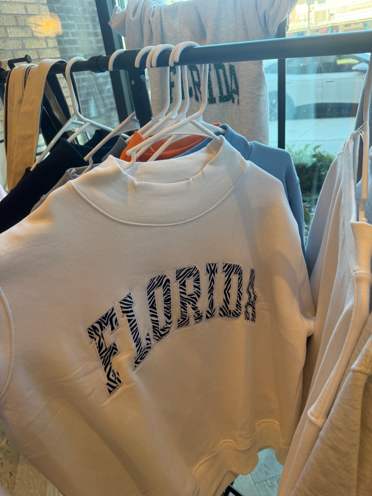 WHITE WITH NAVY ZEBRA FLORIDA MOCKNECK