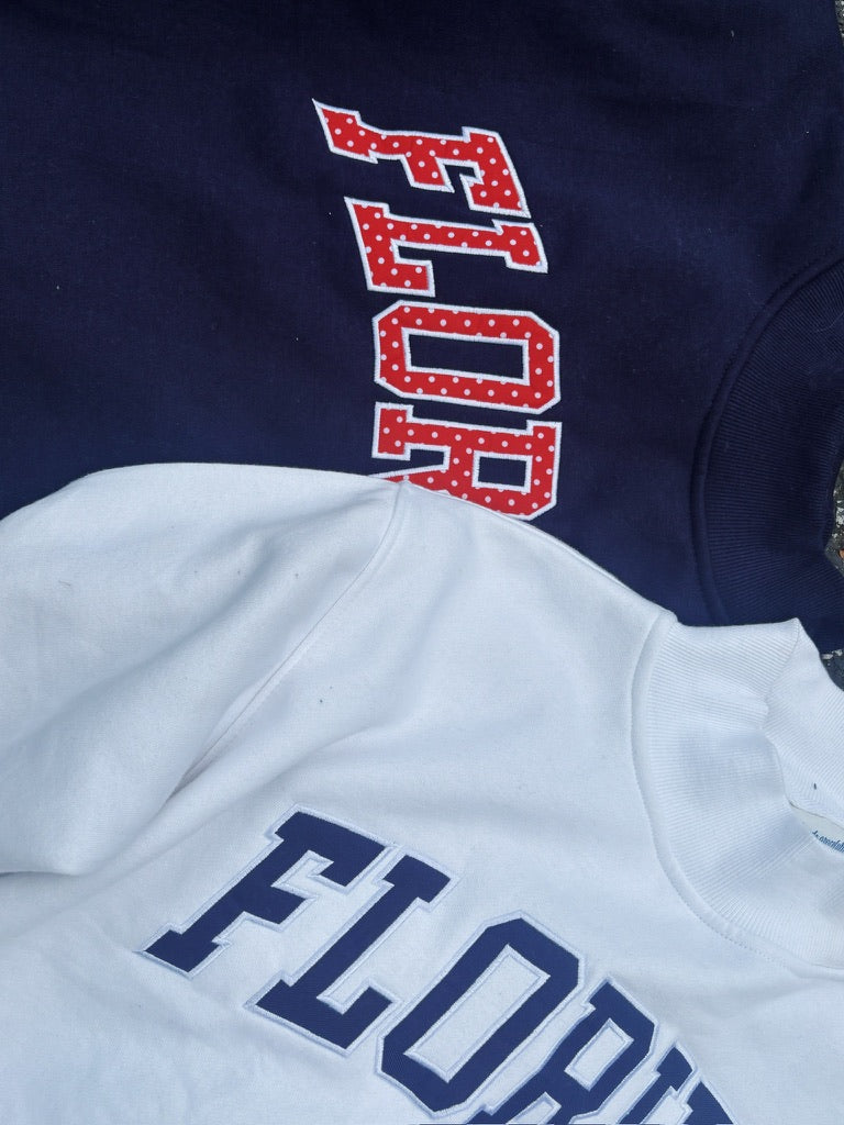 FLORIDA- TRUE NAVY AND RED POLKA DOT MOCK NECK