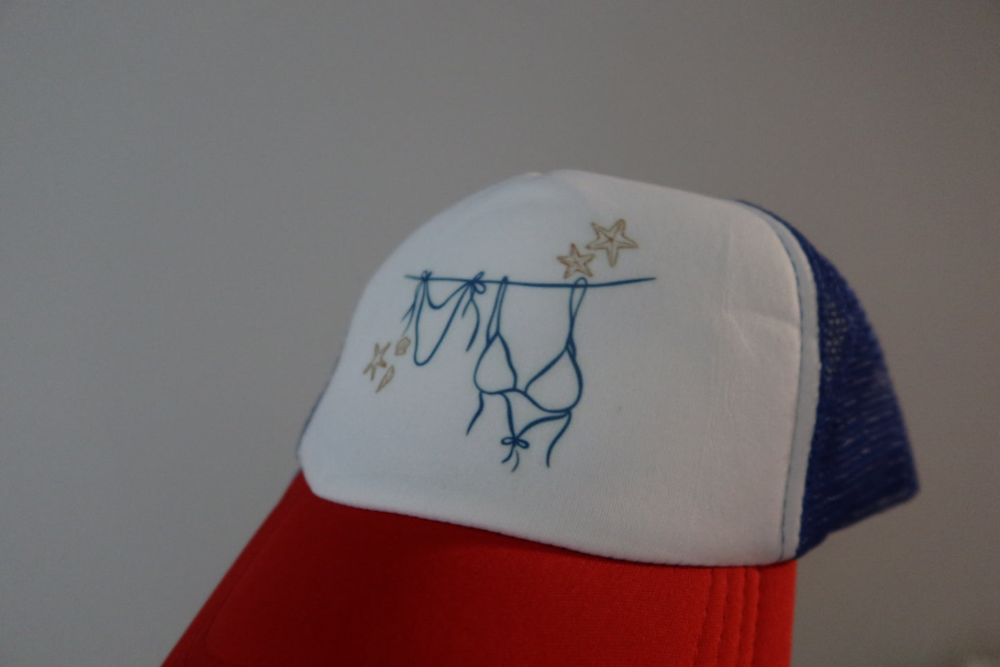 USA COASTAL BIKINI TRUCKER HAT