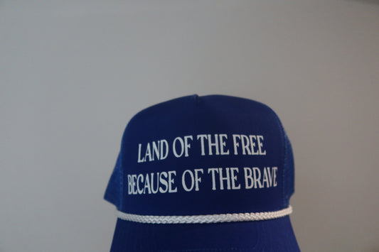 LAND OF THE FREE BECAUSE OF THE BRAVE-ROYAL BLUE AND WHITE HAT