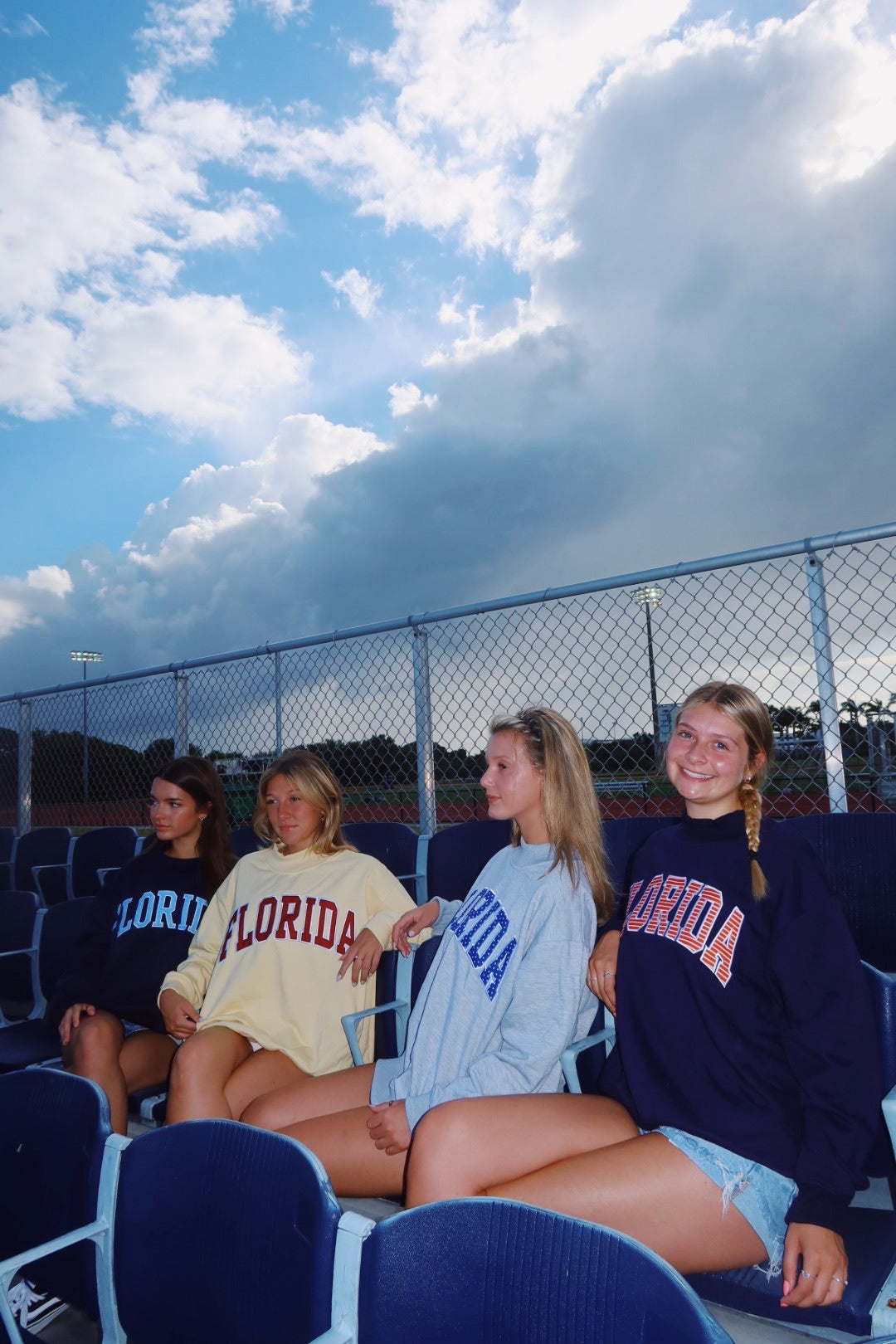 FLORIDA- NAVY AND ORANGE STRIPES MOCK NECK