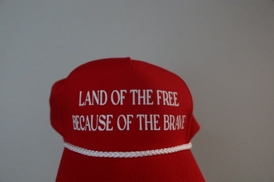 LAND OF THE FREE BECAUSE OF THE BRAVE-RED AND WHITE HAT