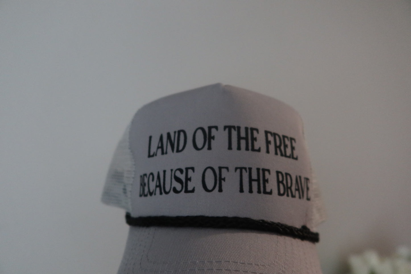 LAND OF THE FREE BECAUSE OF THE BRAVE-GREY AND BLACK HAT