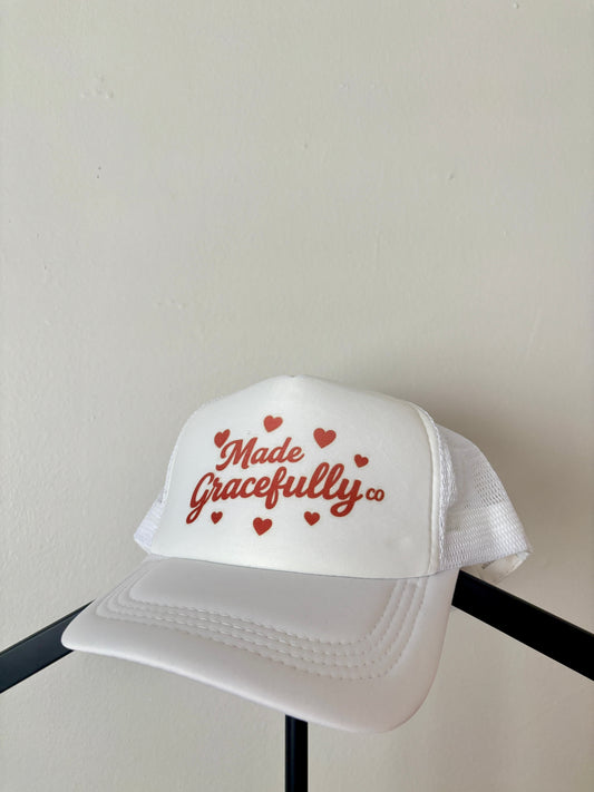 MADE GRACEFULLY CO HEARTS HAT