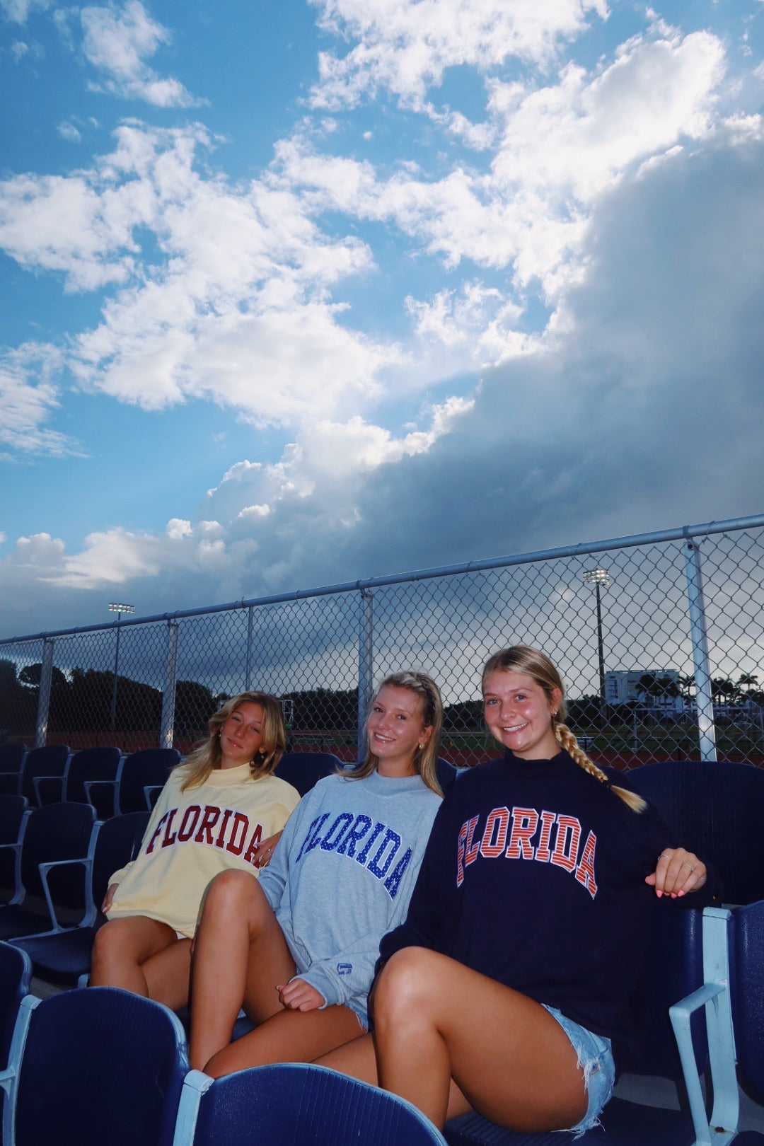 FLORIDA- NAVY AND ORANGE STRIPES MOCK NECK