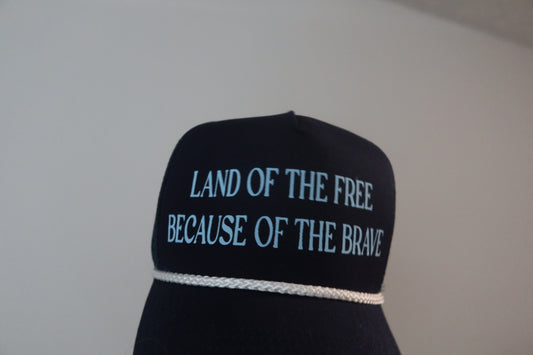 LAND OF THE FREE BECAUSE OF THE BRAVE-NAVY AND LIGHT BLUE HAT