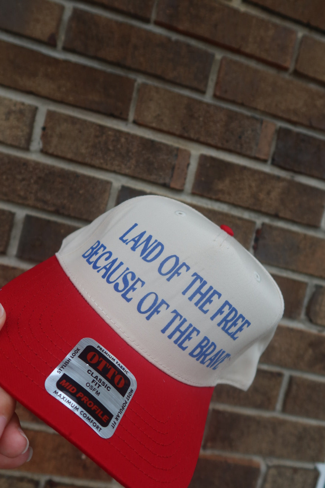 LAND OF THE FREE BECAUSE OF THE BRAVE-NATURAL AND RED HAT