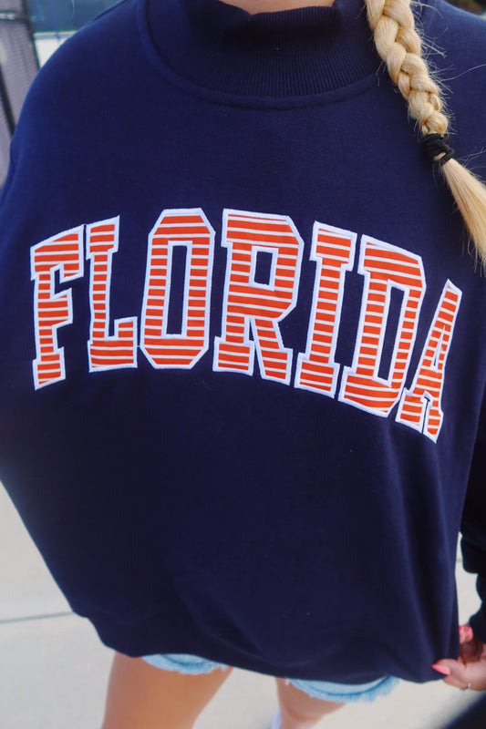FLORIDA- NAVY AND ORANGE STRIPES MOCK NECK