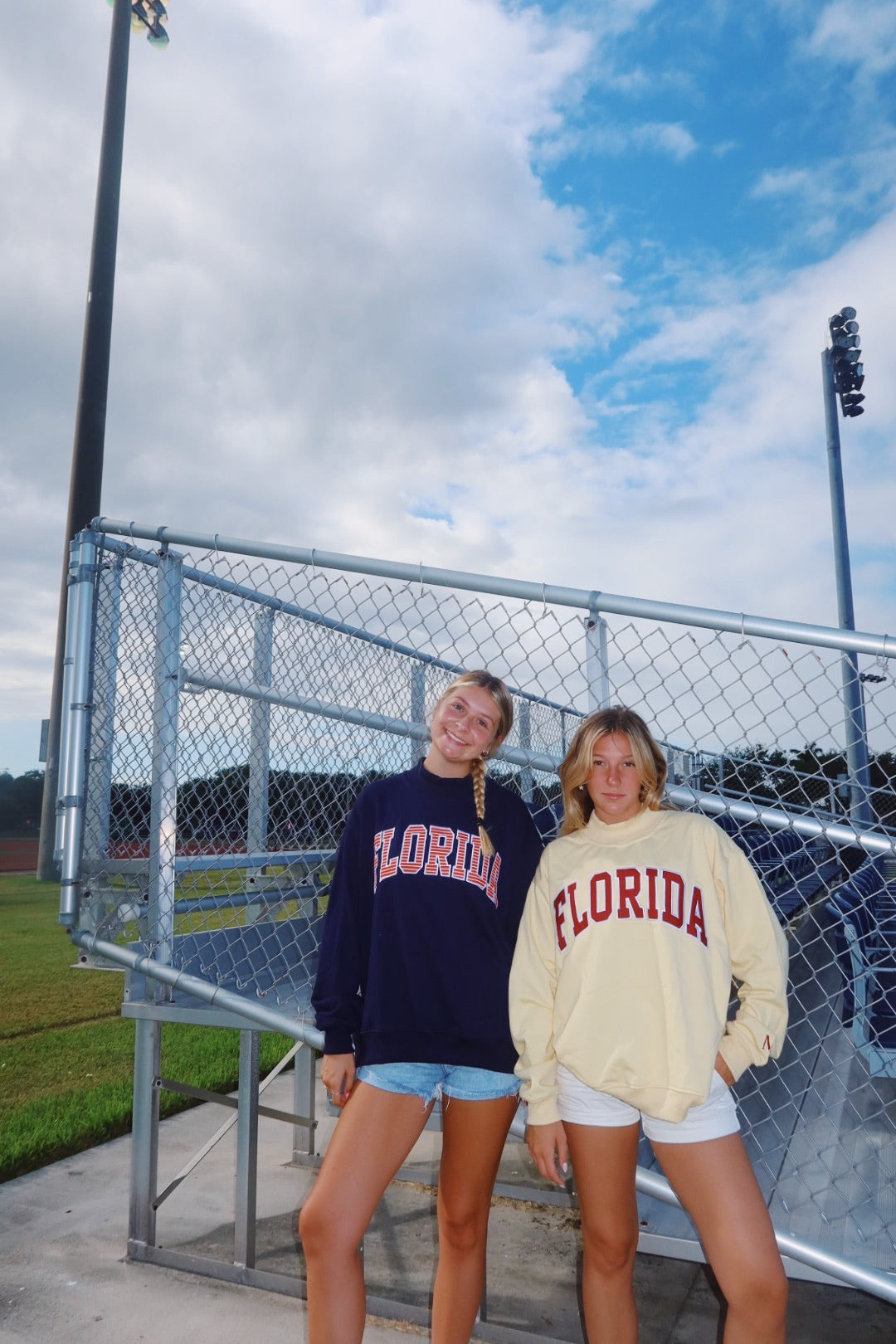 FLORIDA- NAVY AND ORANGE STRIPES MOCK NECK