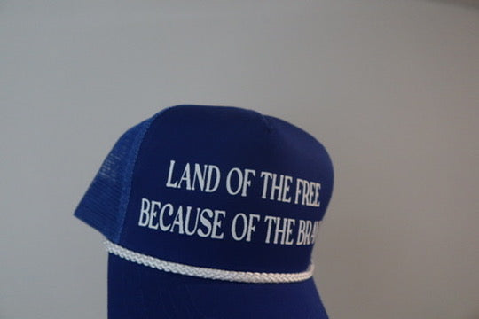 LAND OF THE FREE BECAUSE OF THE BRAVE-ROYAL BLUE AND WHITE HAT