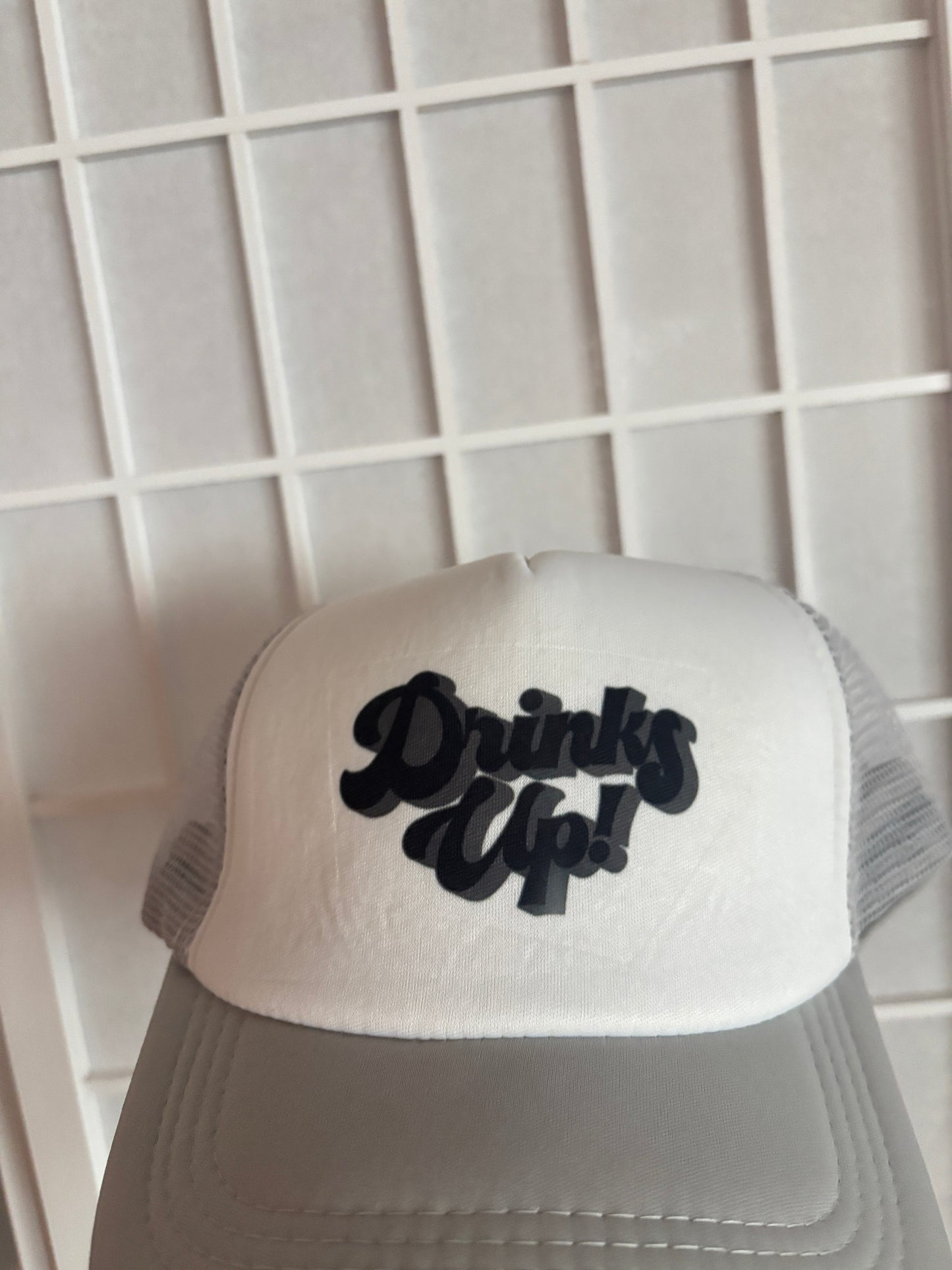 DRINKS UP GREY AND BLACK TRUCKER HAT