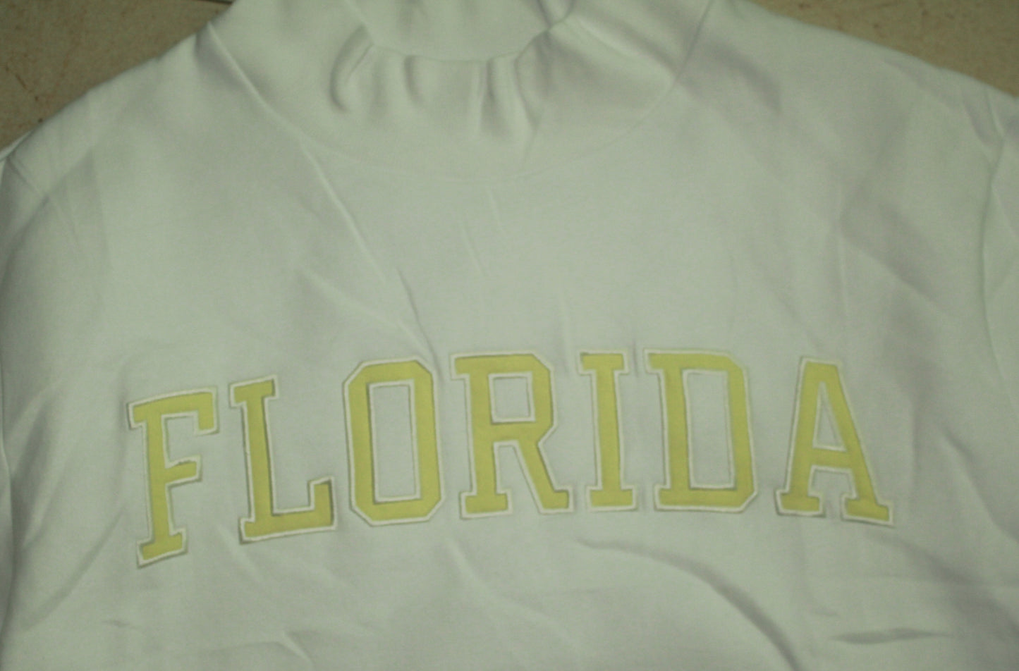 FLORIDA WHITE AND YELLOW MOCK NECK