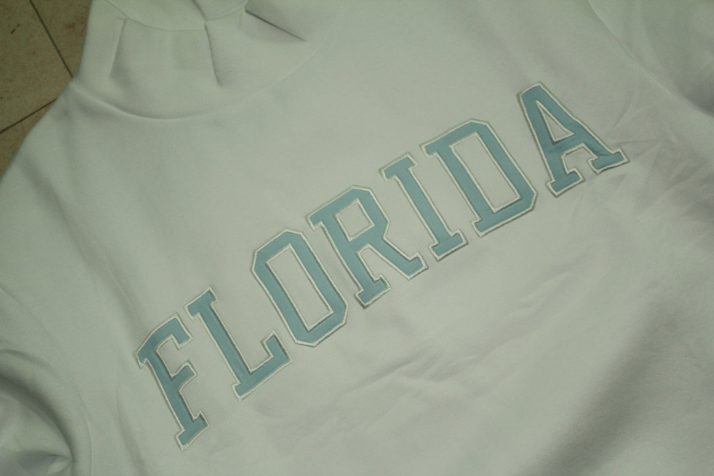 FLORIDA WHITE AND LIGHT BLUE MOCK NECK